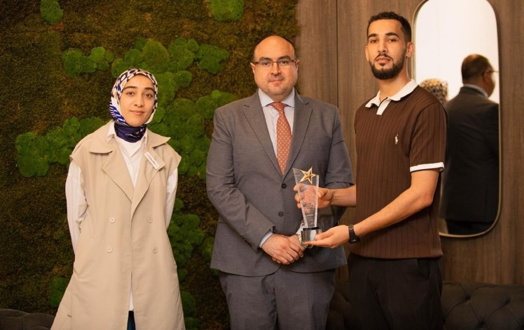DecibeLY Medical Team receiving the 2026 Excellence Shield at the University of Benghazi